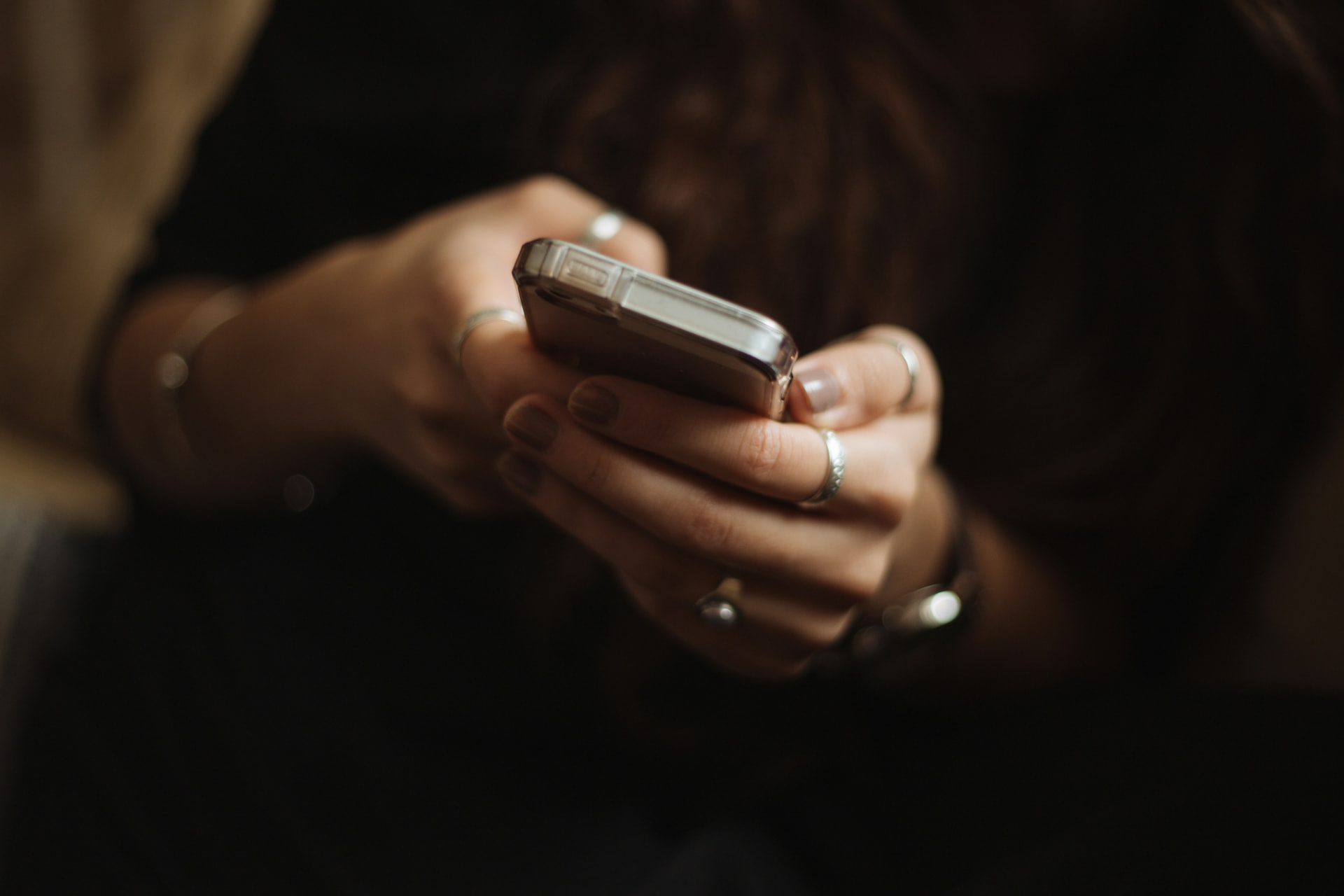 Employee reaching out for benefits help on a mobile phone